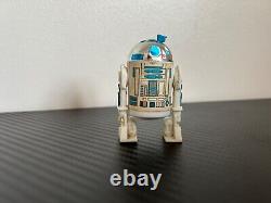 Vintage r2-d2 action figure with working antenna and clicker