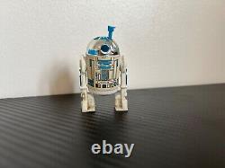 Vintage r2-d2 action figure with working antenna and clicker