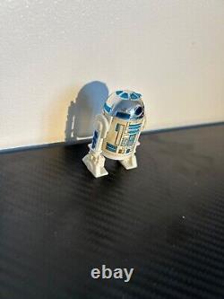 Vintage r2-d2 action figure with working antenna and clicker