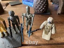 Vintage star wars bounty hunters complete with original weapons Excellent cond