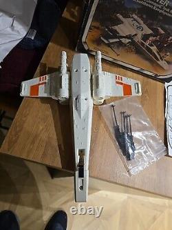 Chasseur X-Wing Star Wars vintage (endommagé lors de la bataille) dans sa boîte Kenner