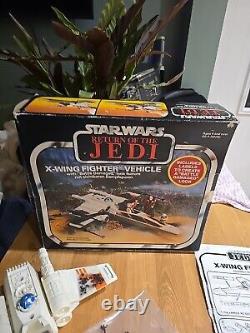 Chasseur X-Wing Star Wars vintage (endommagé lors de la bataille) dans sa boîte Kenner