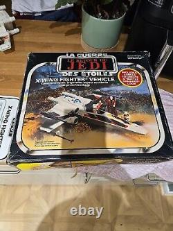 Chasseur X-Wing Star Wars vintage (endommagé lors de la bataille) dans sa boîte Kenner