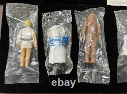 En français, cela se traduirait par : Ensemble complet de figurines vintage Star Wars de 1977, Luke Early Bird, scellé en usine dans des sacs.