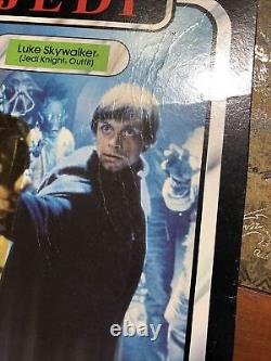 Figurine cartonnée rare de Luke Skywalker en tenue de chevalier Jedi de Star Wars vintage (Kenner)