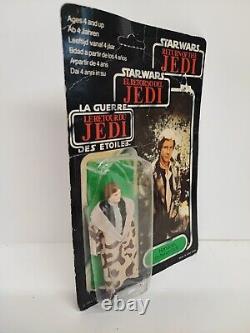 STAR WARS HAN SOLO TRENCH COAT VINTAGE 79 BACK 1983 FIGURE TRI LOGO Non perforé  <br/> 	 <br/> (Note: The French translation provided does not include the term 'unpunched' as it does not directly translate in this context. Instead, it is specified that the figure is non-perforated.)