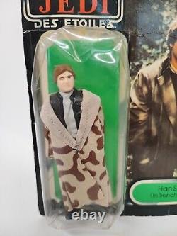 STAR WARS HAN SOLO TRENCH COAT VINTAGE 79 BACK 1983 FIGURE TRI LOGO Non perforé <br/><br/> 
(Note: The French translation provided does not include the term 'unpunched' as it does not directly translate in this context. Instead, it is specified that the figure is non-perforated.)