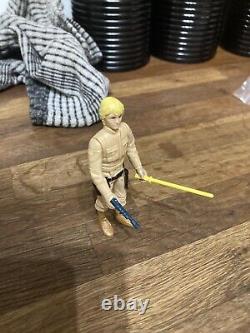 Star Wars d'époque : Luke Skywalker Bespin avec le sabre laser et le blaster d'origine