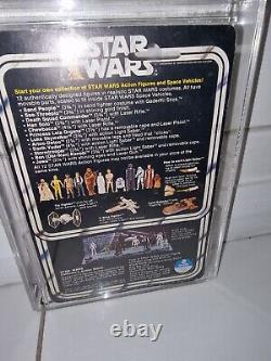 Traduisez ce titre en français : Vintage Star Wars 12 Back A Han Solo petite tête AFA75, veuillez lire la description.