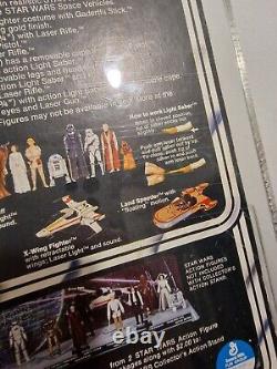 Traduisez ce titre en français : Vintage Star Wars 12 Back A Han Solo petite tête AFA75, veuillez lire la description.